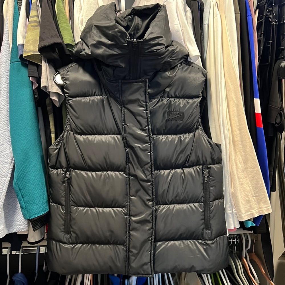 Nike down fill puffer vest with oversized hood.